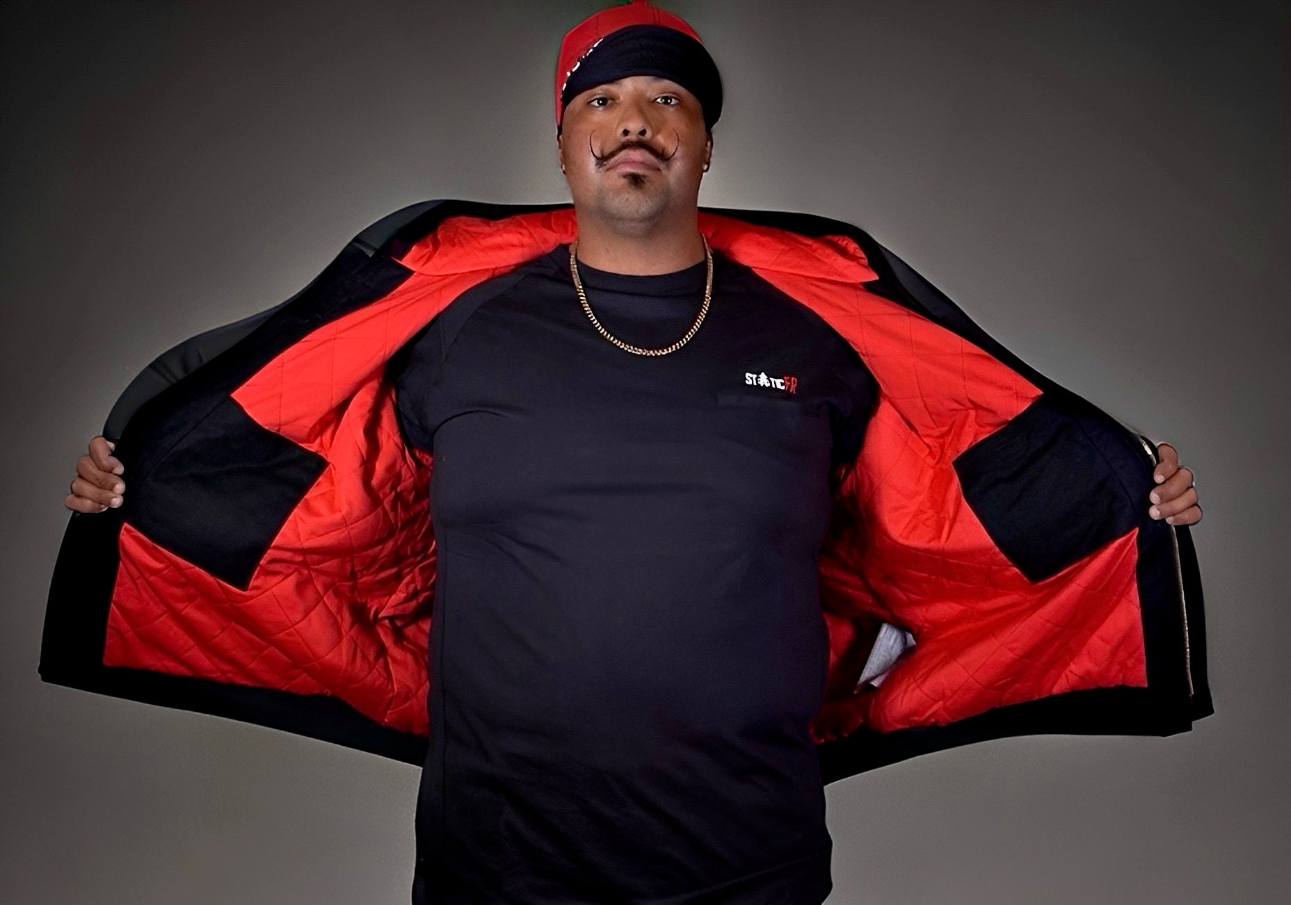 Static FR Black Insulated CAT3 Jacket bomber with black exterior and red quilted interior on Tampa Home & Garden Store