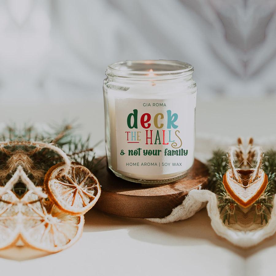 Deck The Halls candle by Gia Roma in a clear glass jar with a colorful label, soy wax on Tampa Home & Garden Store