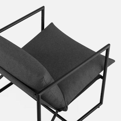 Sillón decorativo moderno gris oscuro tapizado con estructura metálica