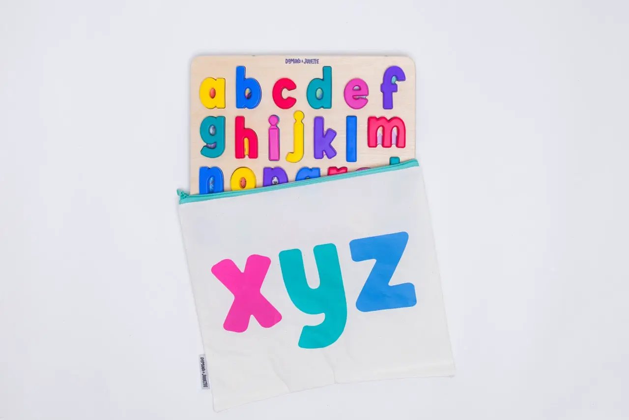 Find & Fit Puzzle Domino & Juliette, wooden alphabet in bright colors with a white pouch on Tampa Home & Garden Store