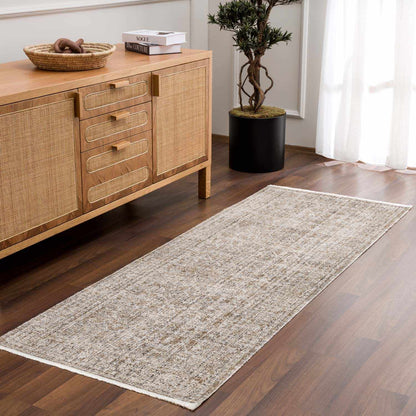 Uzuri washable outdoor area rug runner in beige with textured pattern on wood floor on Tampa Home & Garden Store