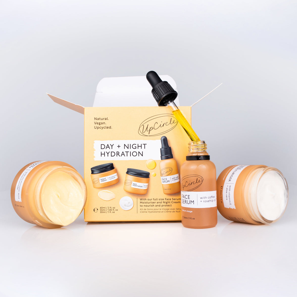 UpCircle Day + Night Hydration Set orange bottles and jars with dropper on Tampa Home & Garden Store