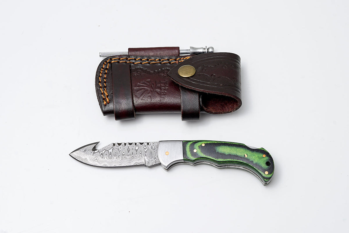Gut Hook hunting knife TF-103 with green Micarta handle and Damascus blade, brown leather sheath on Tampa Home & Garden Store