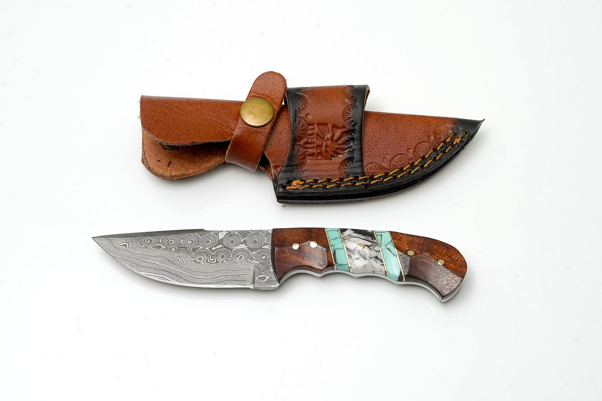 Hand-forged Damascus field knife with turquoise wood handle and brown leather sheath on Tampa Home & Garden Store