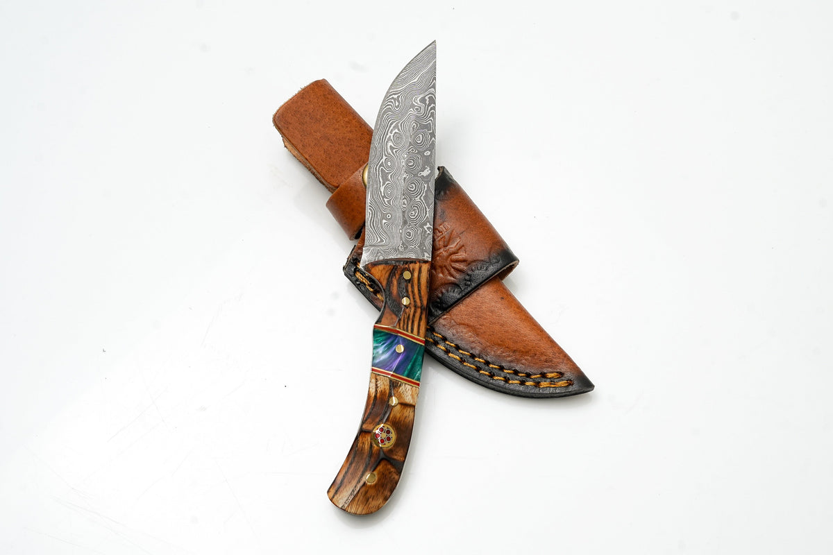 Hand-Forged Damascus Skinner knife with torched wood and resin hybrid handle, brown leather sheath on Tampa Home & Garden Store