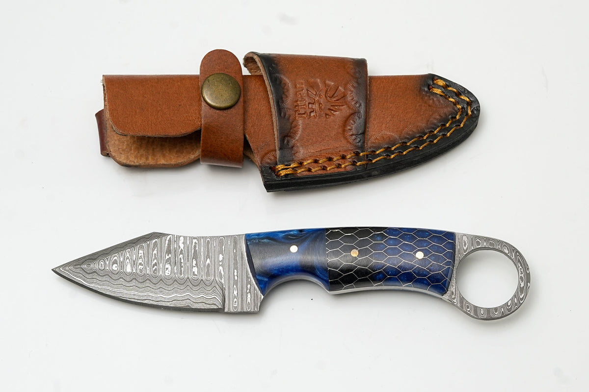 Damascus Ring Skinner knife with blue honeycomb handle in leather sheath on Tampa Home & Garden Store