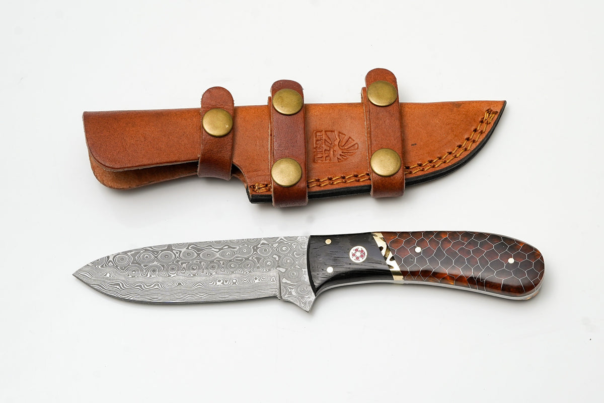 Damascus Hunter knife with amber honeycomb handle and black wood scales in leather sheath on Tampa Home & Garden Store