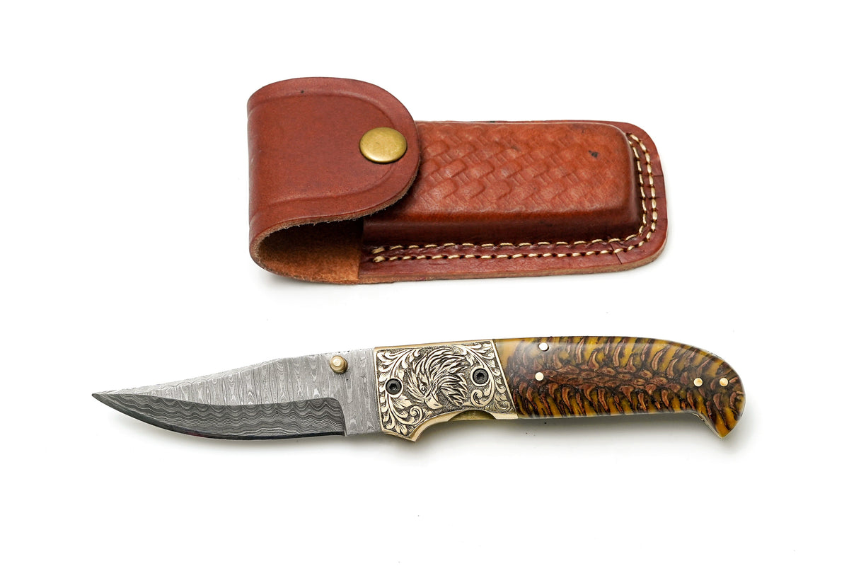 Damascus steel clippoint folding knife with eagle bolster amber pinecone handle TF-104 on Tampa Home & Garden Store