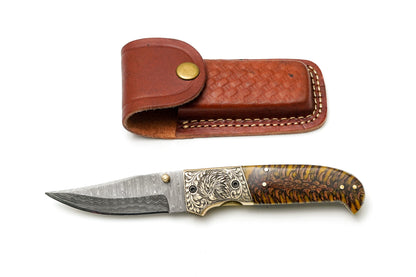 Damascus steel clippoint folding knife with eagle bolster amber pinecone handle TF-104 on Tampa Home & Garden Store