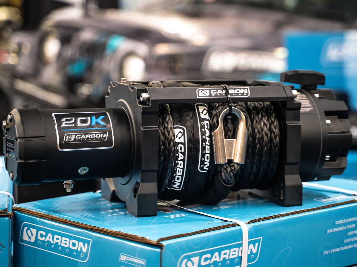 Carbon Offroad Scout Pro 20K 24V truck winch with black housing and braided rope on Tampa Home & Garden Store