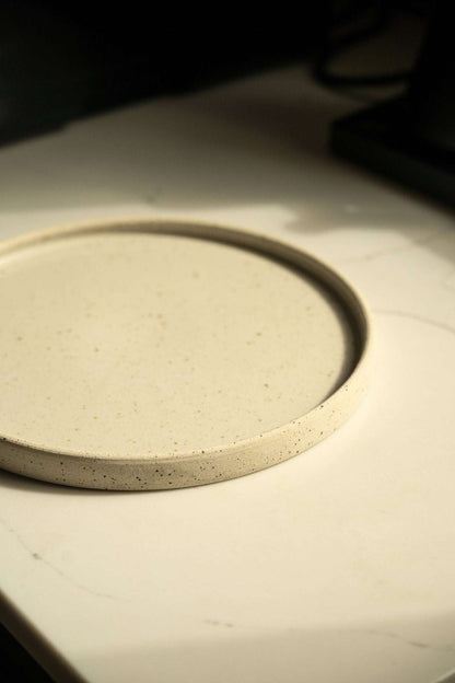 Handmade stoneware plate white with speckles close-up view of speckled rim on Tampa Home & Garden Store