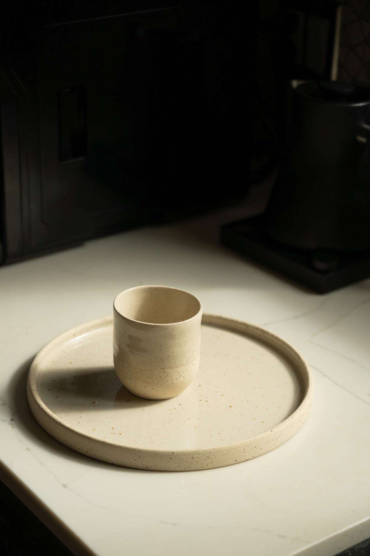 Handmade stoneware plate white with speckles, plate and small cup set on Tampa Home & Garden Store