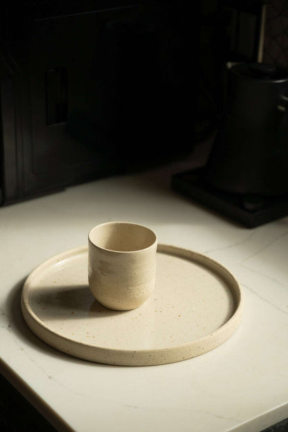 Handmade stoneware plate white with speckles, plate and small cup set on Tampa Home & Garden Store