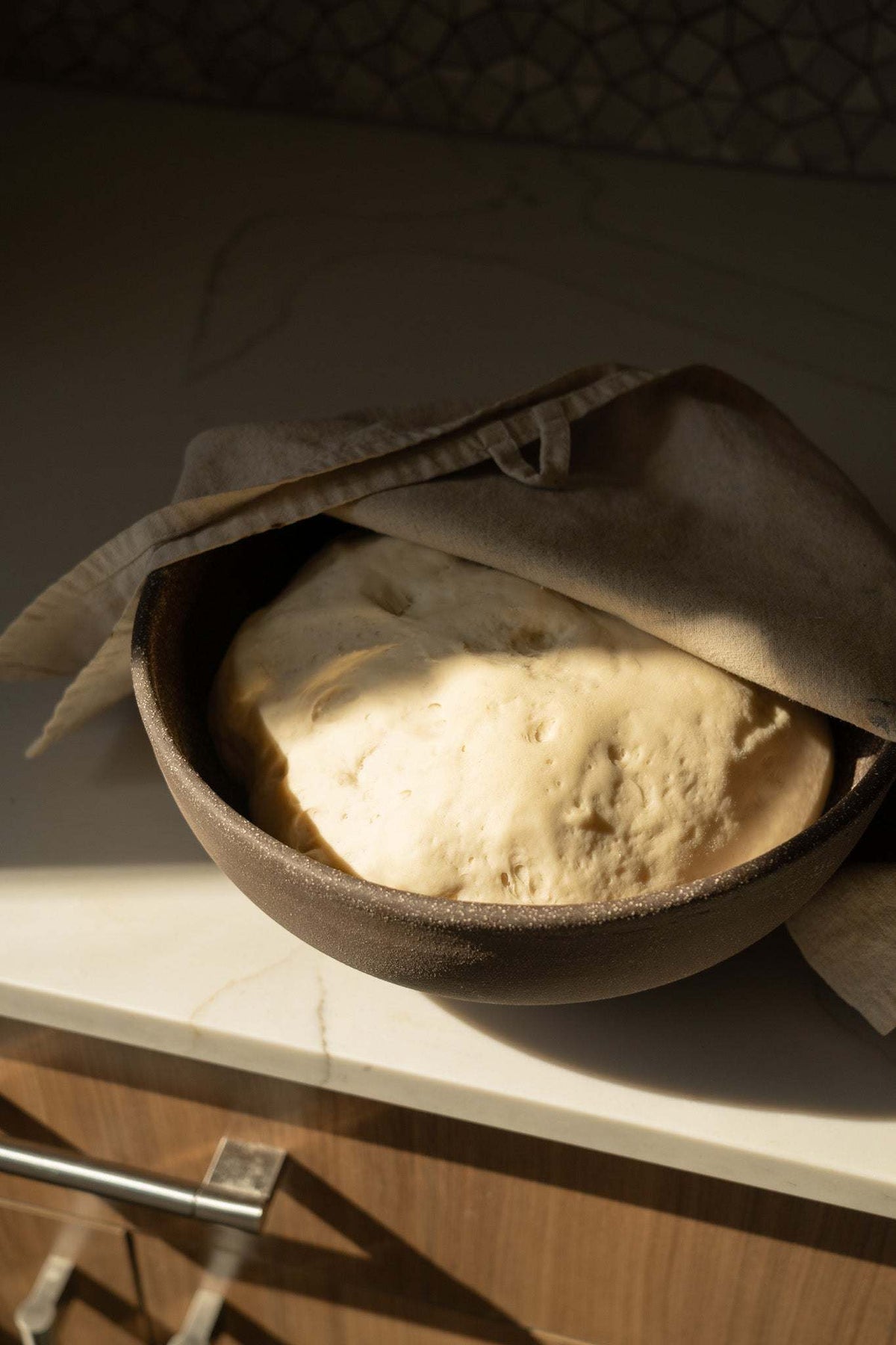 Stoneware large fruit bowl with linen liner containing dough in a kitchen on Tampa Home & Garden Store