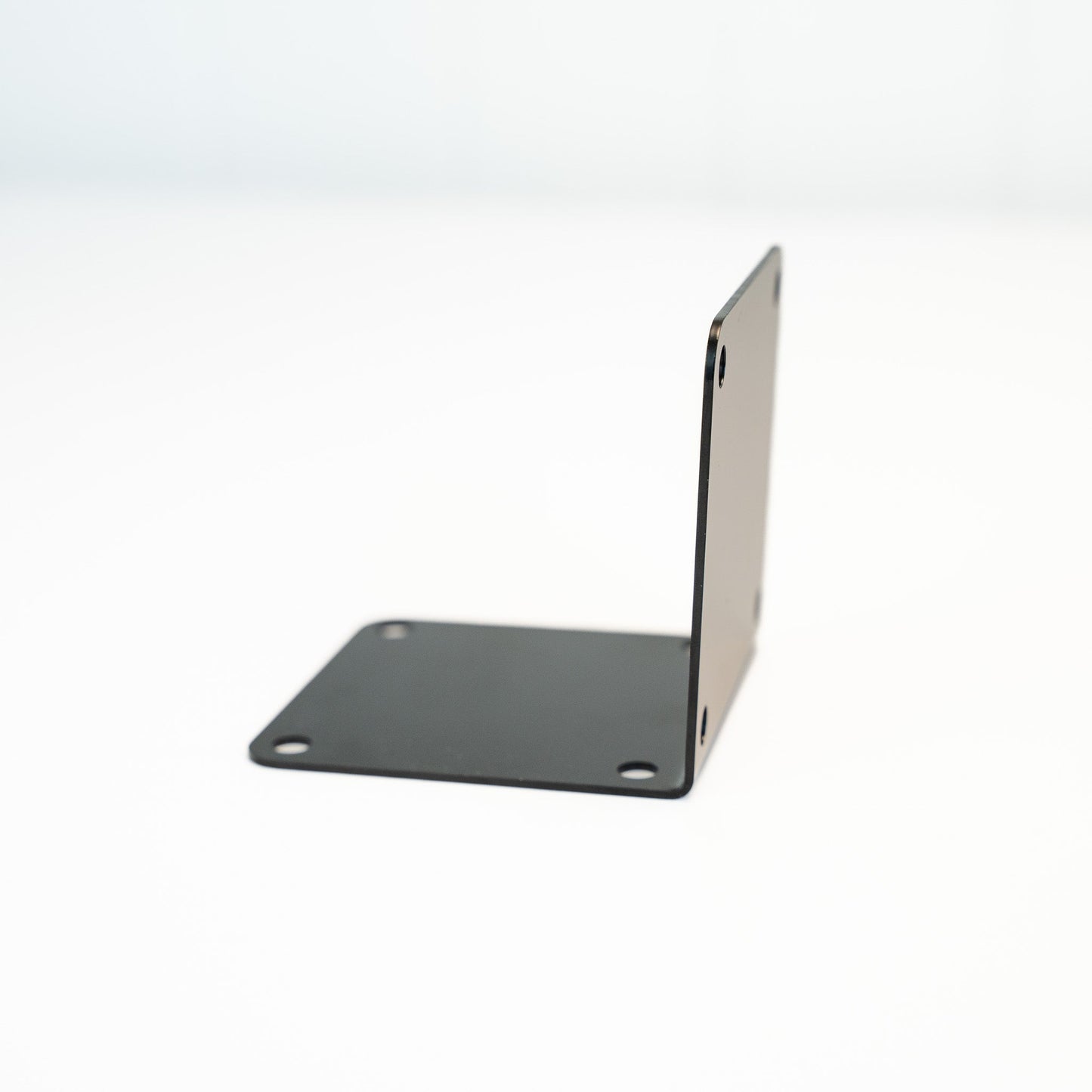 Stainless L-shaped battery isolator mounting bracket with base plate and mounting holes on Tampa Home & Garden Store