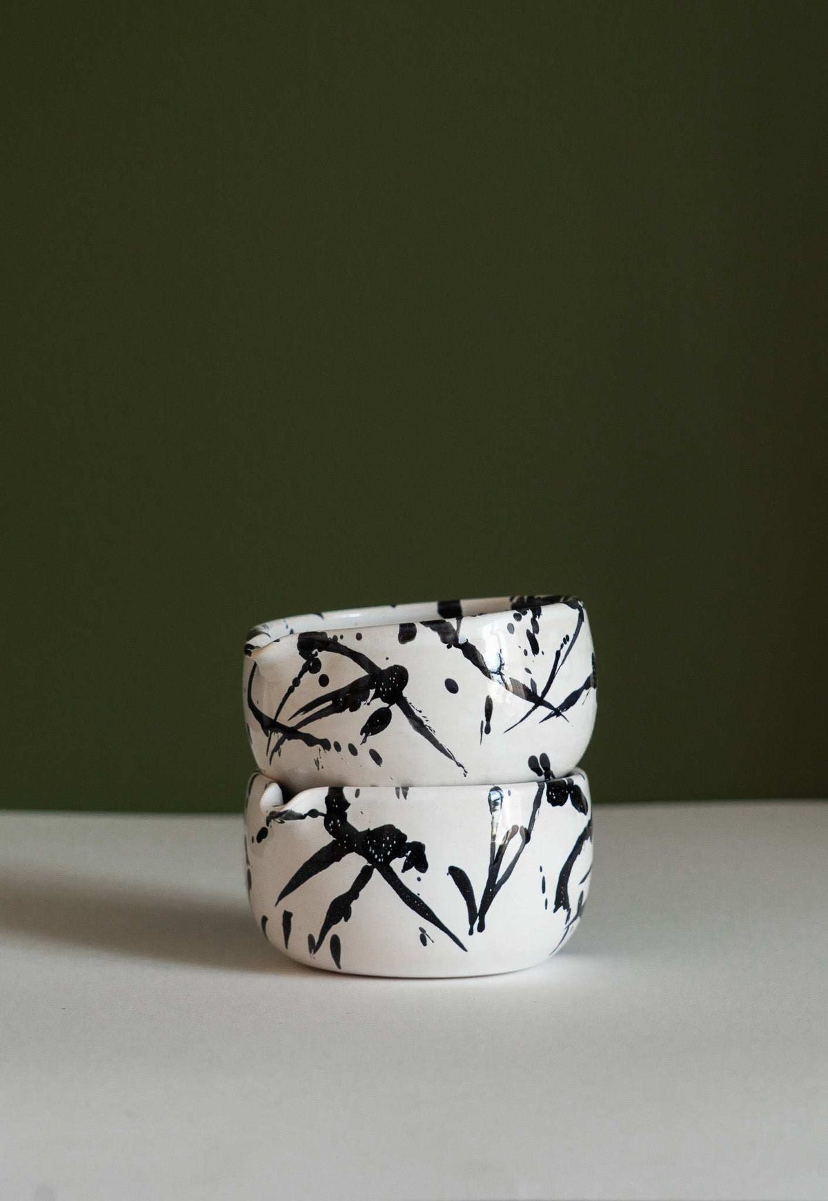 Matcha bowl white ceramic with black abstract splatter, stacked pair on Tampa Home & Garden Store