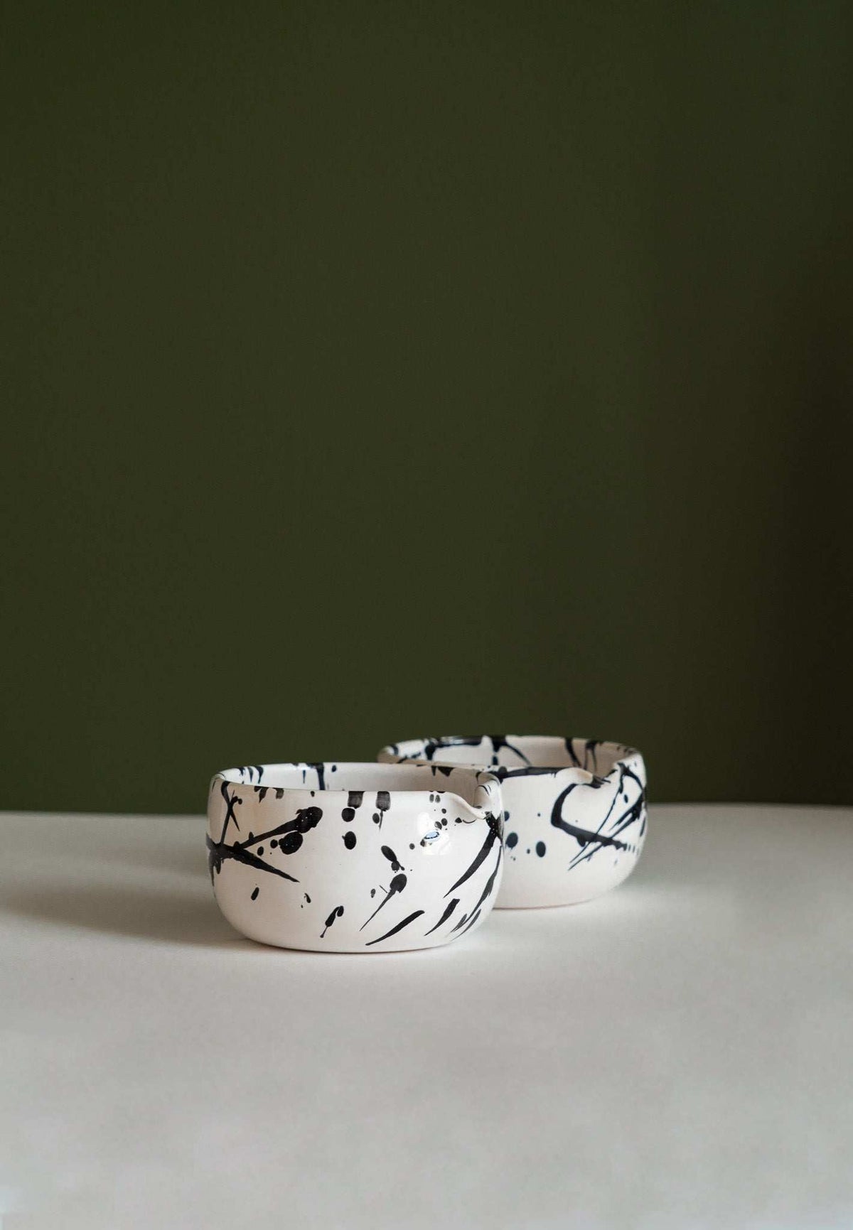 Matcha bowls with black ink splatter pattern, white speckled ceramic pair by CREATING COMFORT on Tampa Home & Garden Store