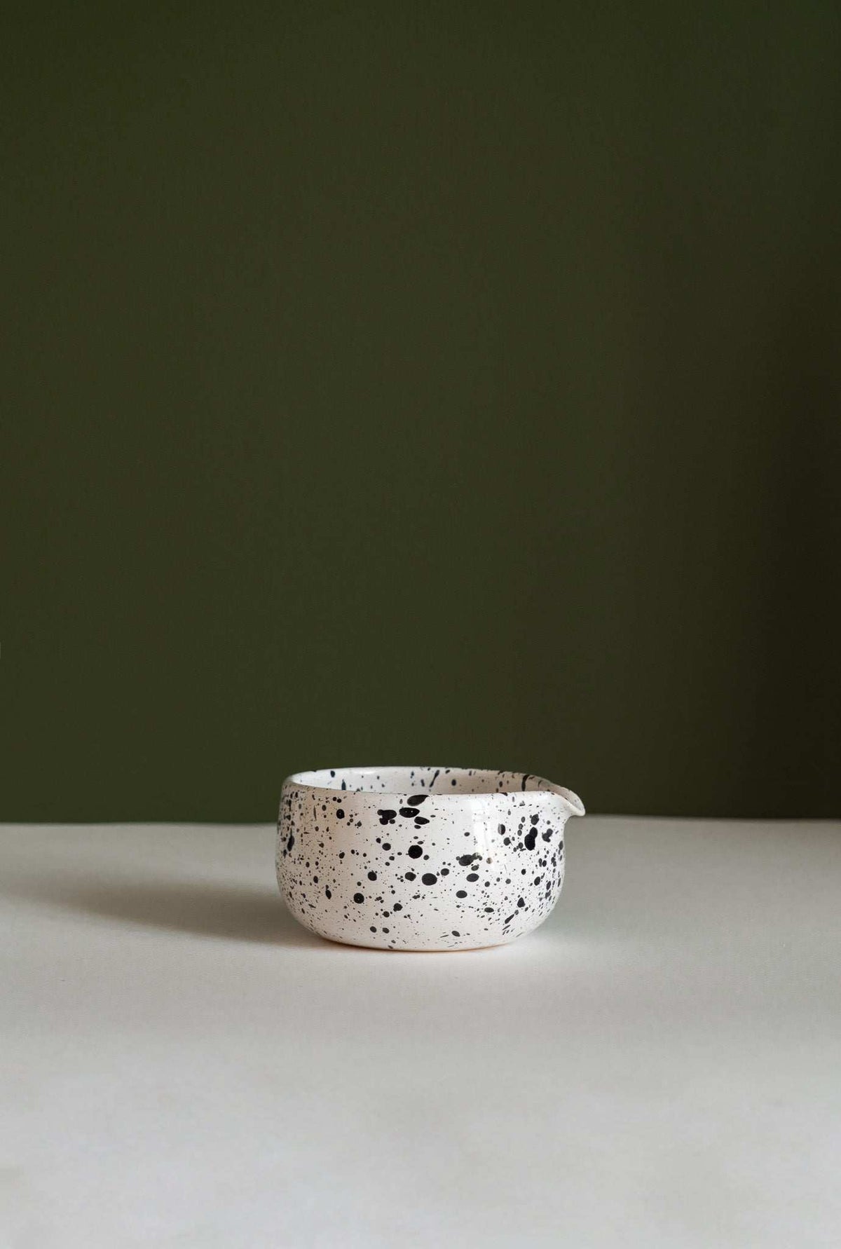 Matcha bowl handmade speckled white ceramic with black splatters on Tampa Home & Garden Store