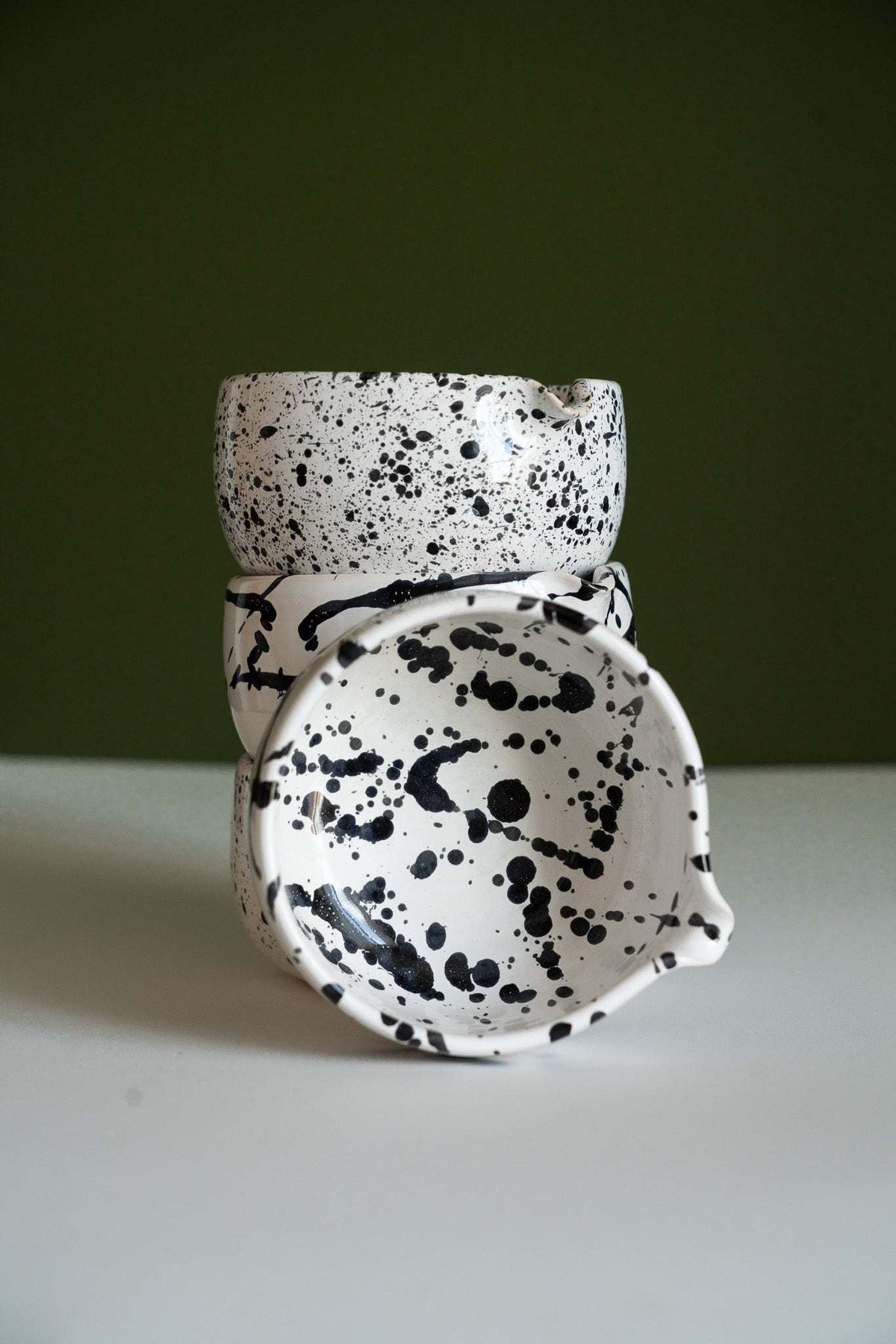 Matcha bowl speckled with black splatter, handmade by Creating Comfort, stacked bowls on Tampa Home & Garden Store