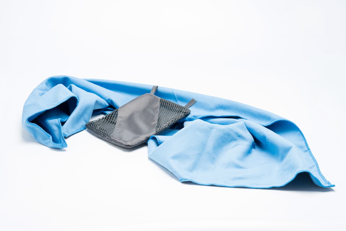 Microfiber towel by River Country Gear in blue with gray mesh pocket on Tampa Home & Garden Store