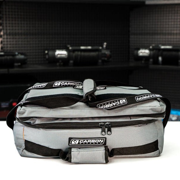 Essential 4x4 Recovery Kit bag by Carbon Offroad USA in gray with black webbing straps on Tampa Home & Garden Store