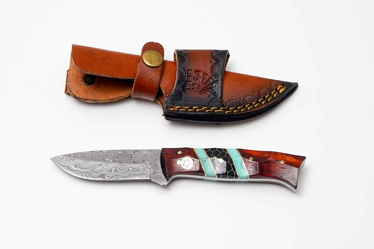 Damascus drop point hunter knife with turquoise and black honeycomb handle in leather sheath on Tampa Home & Garden Store