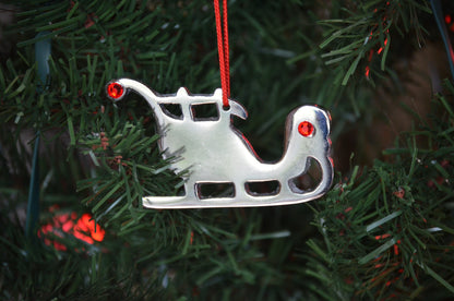 Vibhsa handmade sled Christmas ornament with red ruby gems for holiday decor on Tampa Home & Garden Store