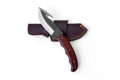 Hand forged carbon gut hook skinner knife Titan TC-017 with dark blade and walnut handle on Tampa Home & Garden Store