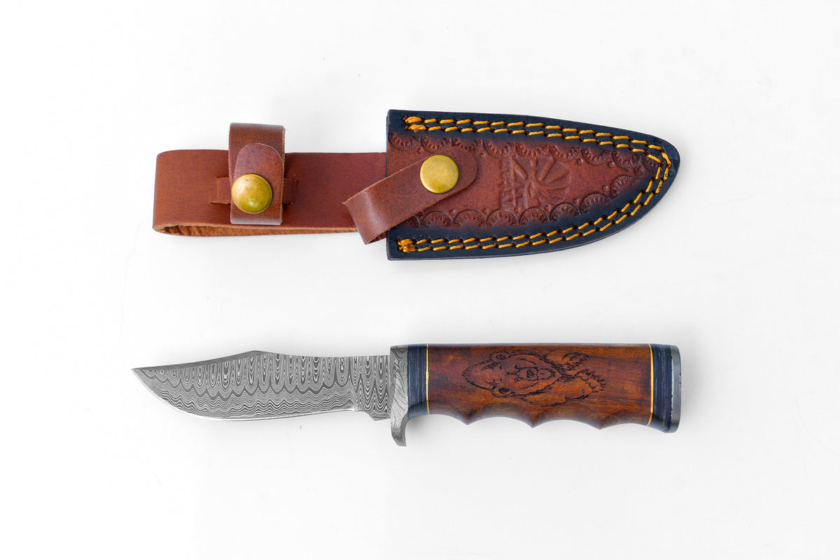 Grizzly Timberline Damascus Knife TK-099 with patterned blade and wooden handle in leather sheath on Tampa Home & Garden Store