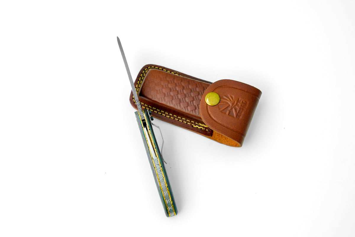 Damascus steel pocket knife TF-056 by Titan Int'l K, rainbow-hued blade, brown sheath on Tampa Home & Garden Store