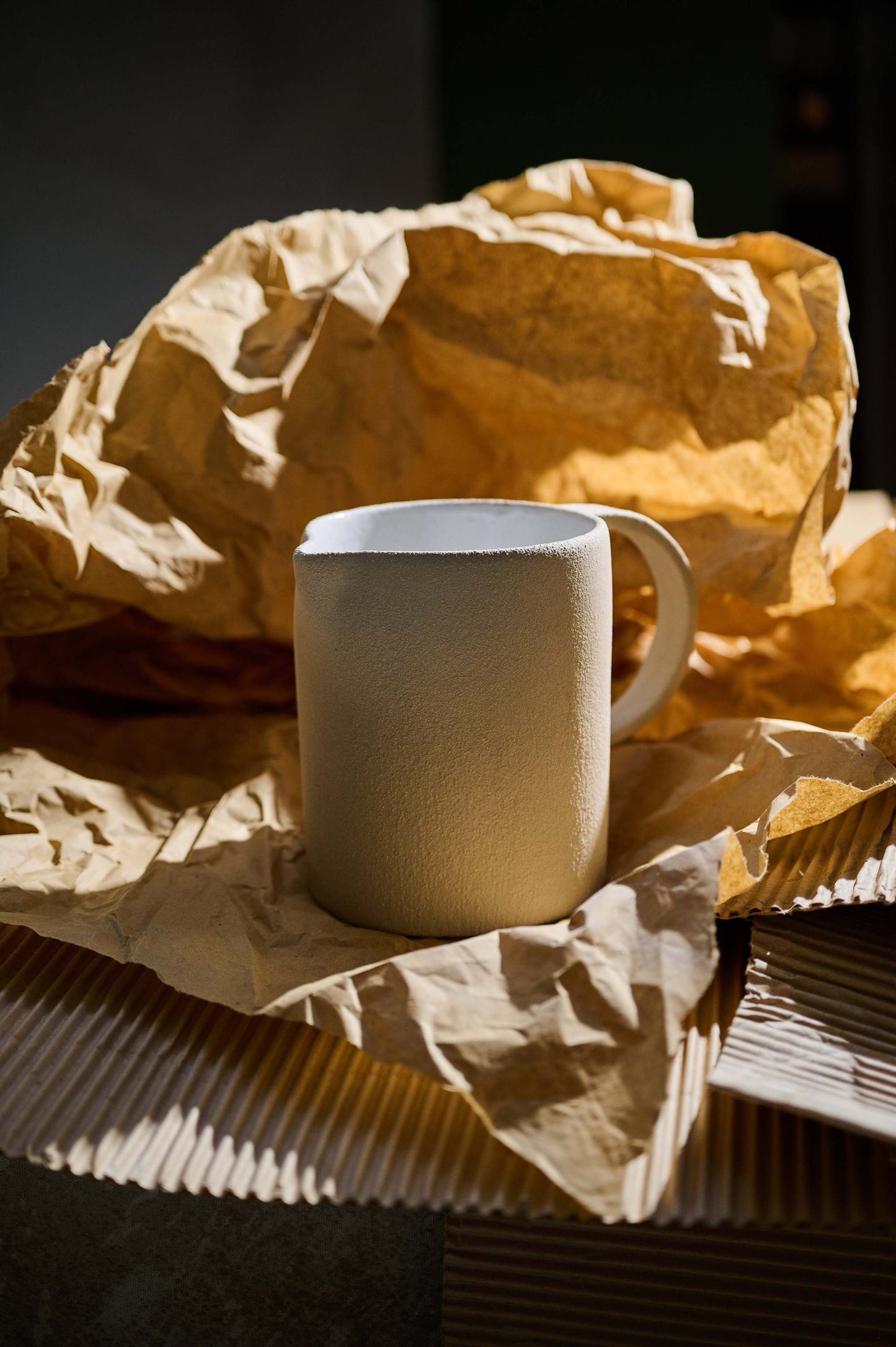 Handmade Stoneware Pitcher and Elegant Tableware