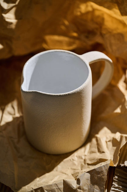 Handmade Stoneware Pitcher and Elegant Tableware