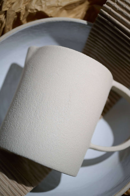 Handmade Stoneware Pitcher and Elegant Tableware