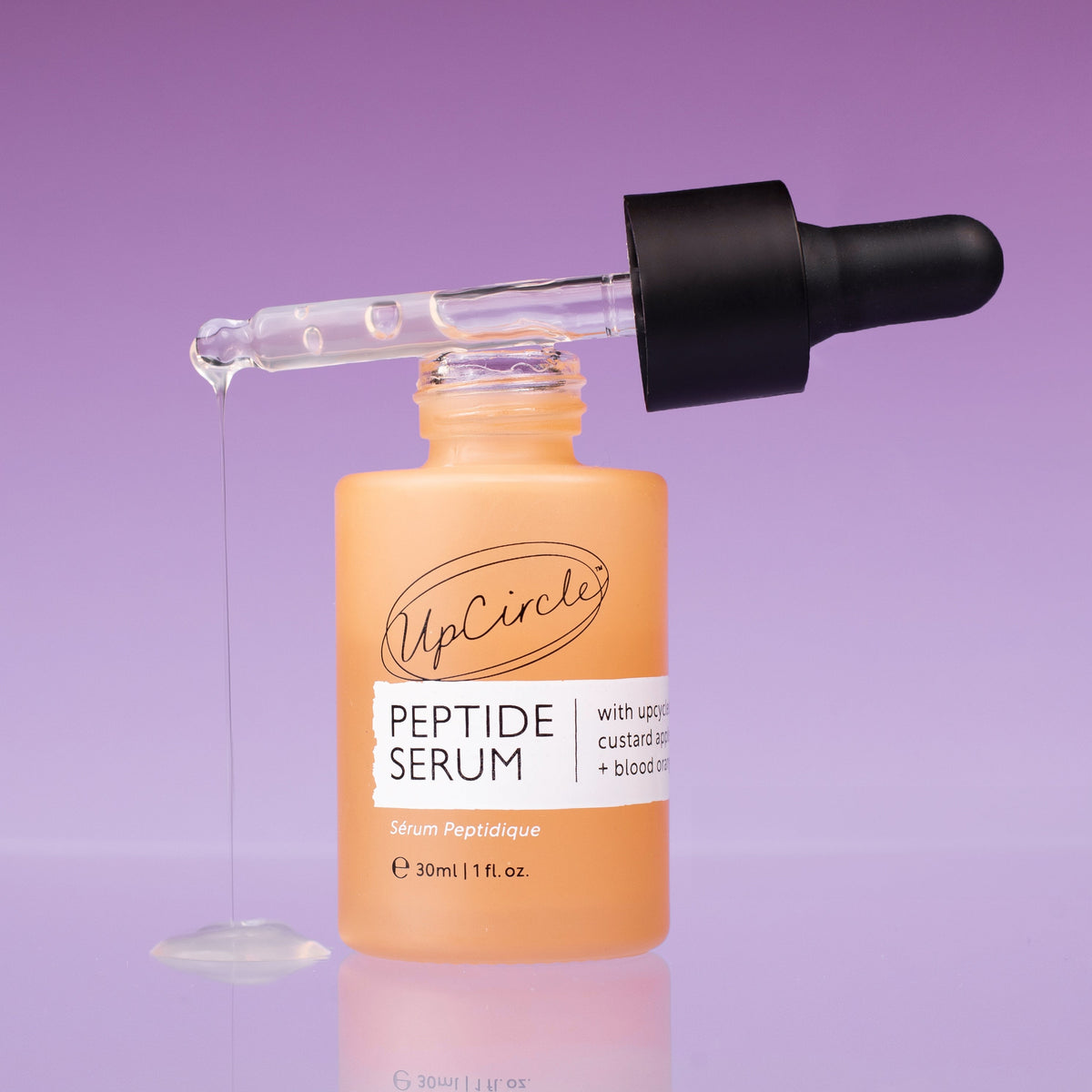 Peptide Serum bottle by UpCircle orange dropper with custard apple + blood orange on Tampa Home & Garden Store