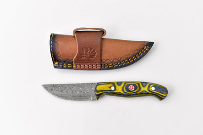 Titan Pointer Damascus knife with yellow-black handle and damascus blade in a leather sheath on Tampa Home & Garden Store