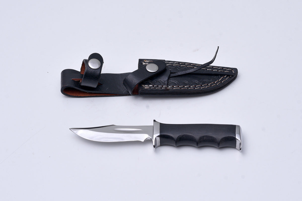 Shadow Fang hunting knife TK-401 by Titan International K; black handle, blade in leather sheath on Tampa Home & Garden Store
