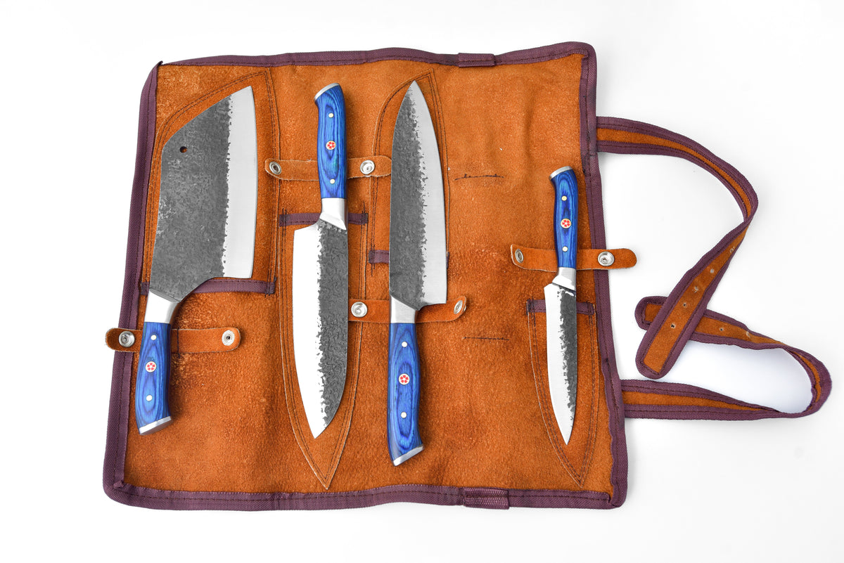 Titan Forge knife set with blue handles and hammered blades in a leather roll on Tampa Home & Garden Store