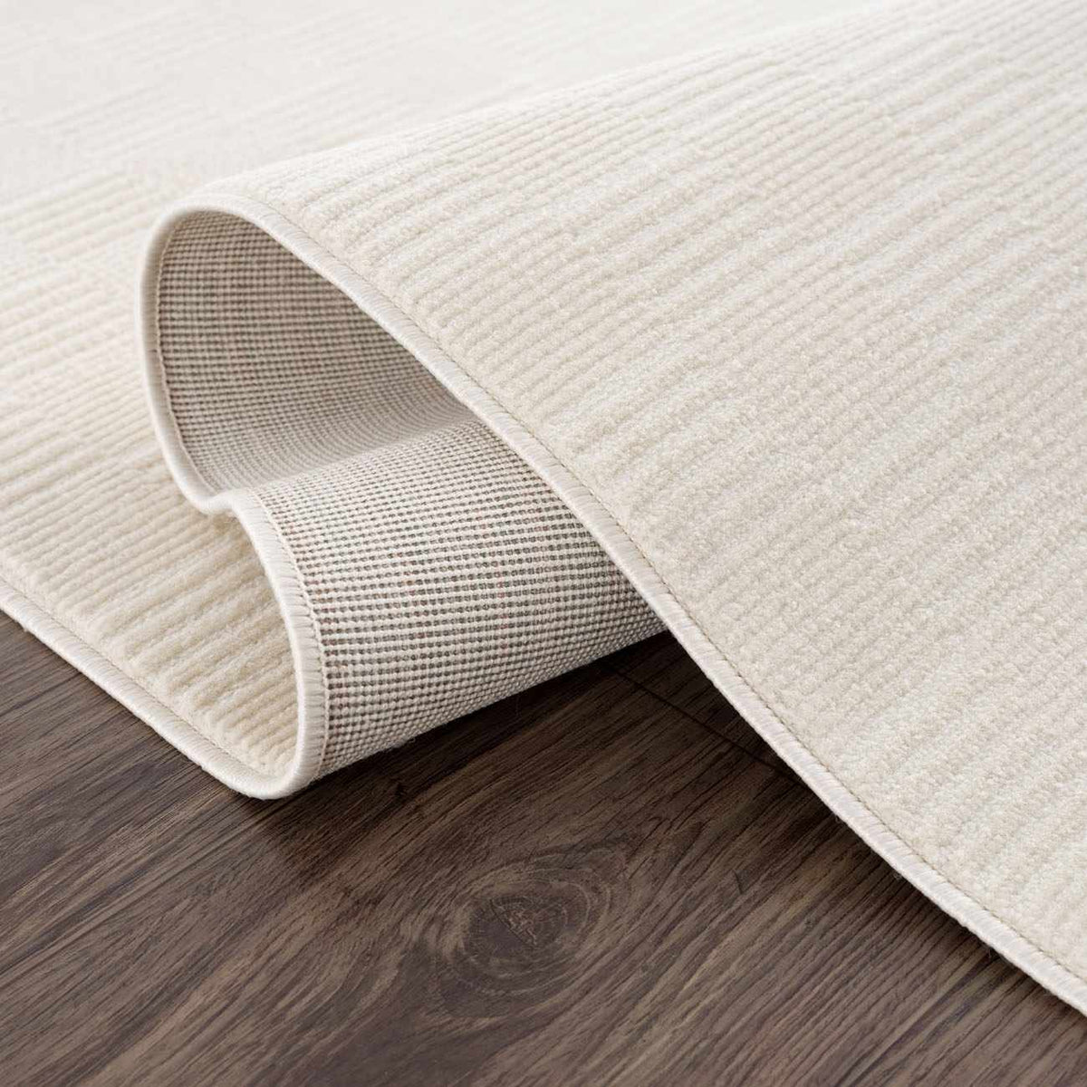Kazuma Cream Checkered Washable Area Rug by Boutique Rugs; cream with checkered underside on Tampa Home & Garden Store