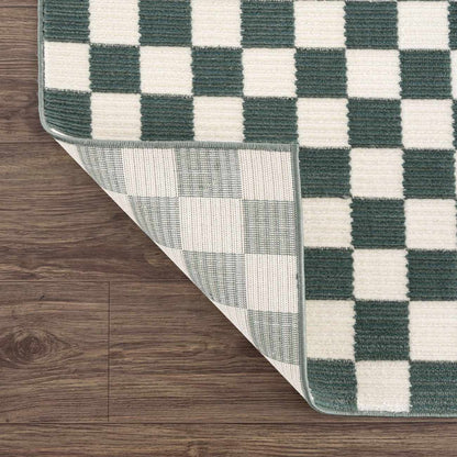 Kaysar Oil Green Checkered Washable Area Rug by Boutique Rugs, bound edge on wood floor on Tampa Home & Garden Store
