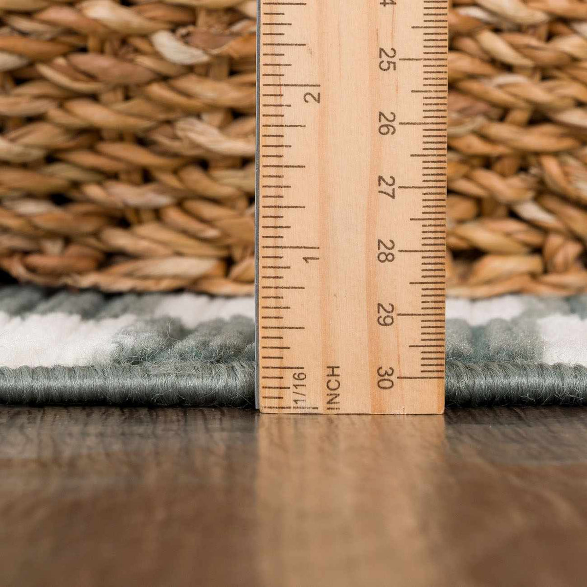 Kaysar Oil Green Checkered Washable Area Rug with soft pile shown beside a ruler for scale on Tampa Home & Garden Store