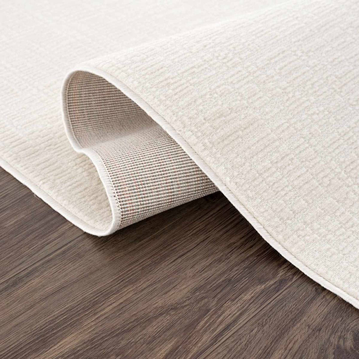 Leanna Cream washable area rug with rolled edge and plaid backing, on Tampa Home & Garden Store