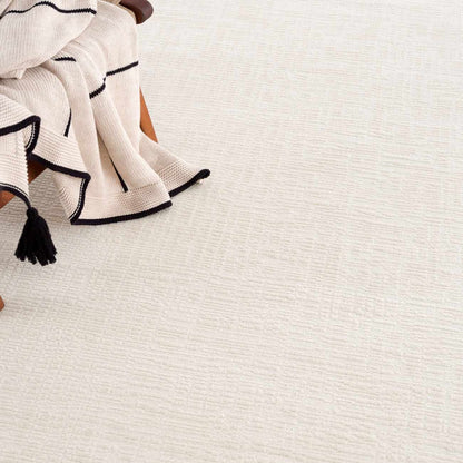 Leanna Cream Washable Area Rug by Boutique Rugs, cream with navy border and tassels on Tampa Home & Garden Store