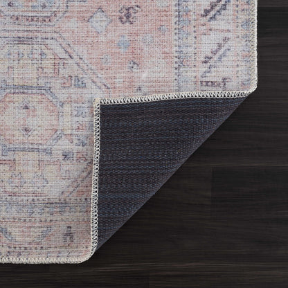 Morcott Peach washable area rug by Boutique Rugs with peach-toned pattern and cream fringe on Tampa Home & Garden Store