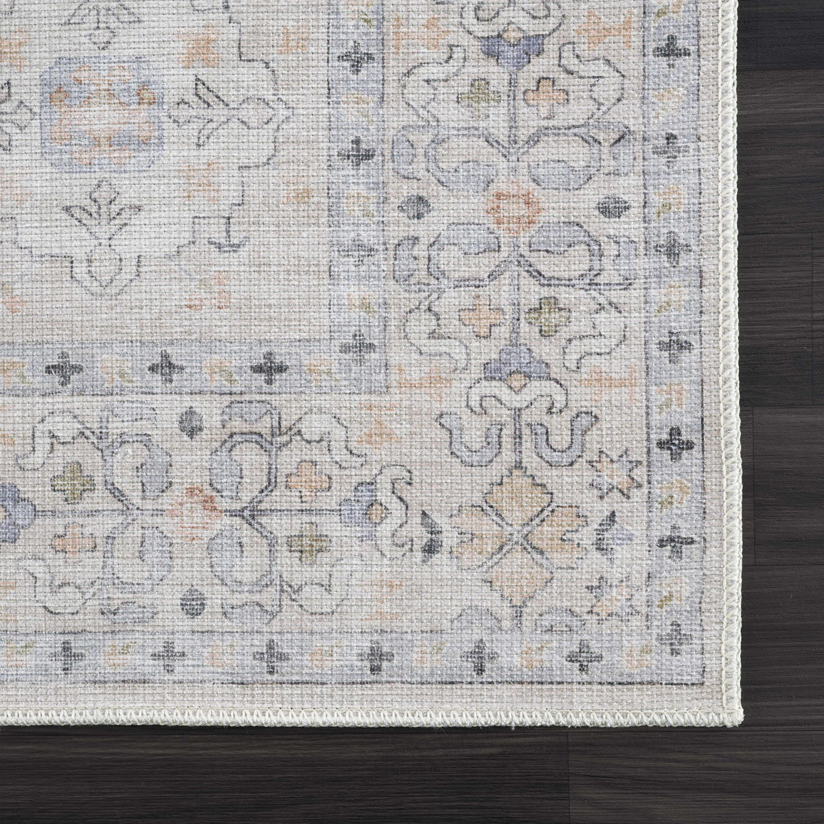 Beige Beckett Washable Rug with vintage-inspired pattern and white border Boutique Rugs on Tampa Home & Garden Store