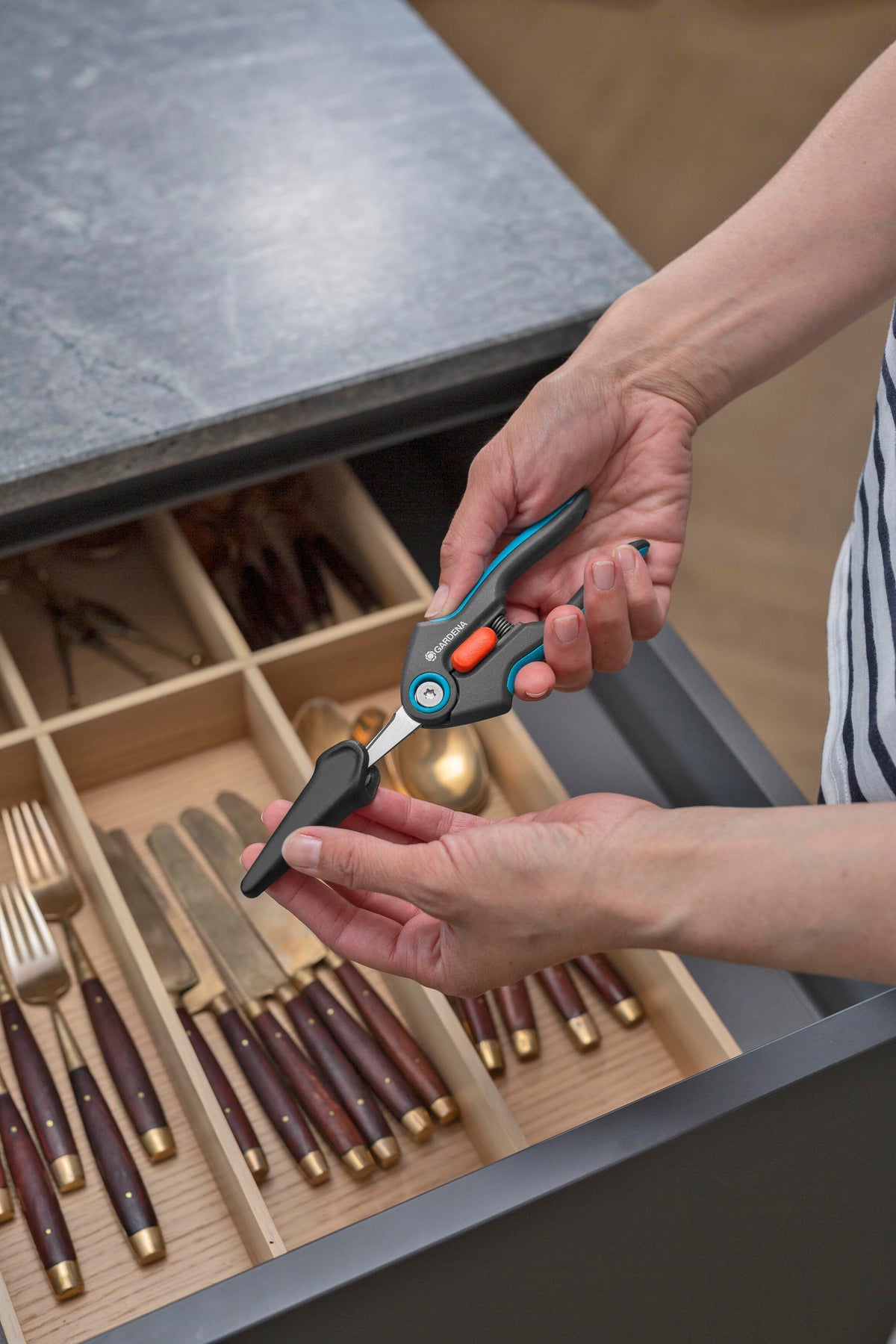 Gardena FreshCut Scissors hand tool with teal accents in use for precise trimming on Tampa Home & Garden Store