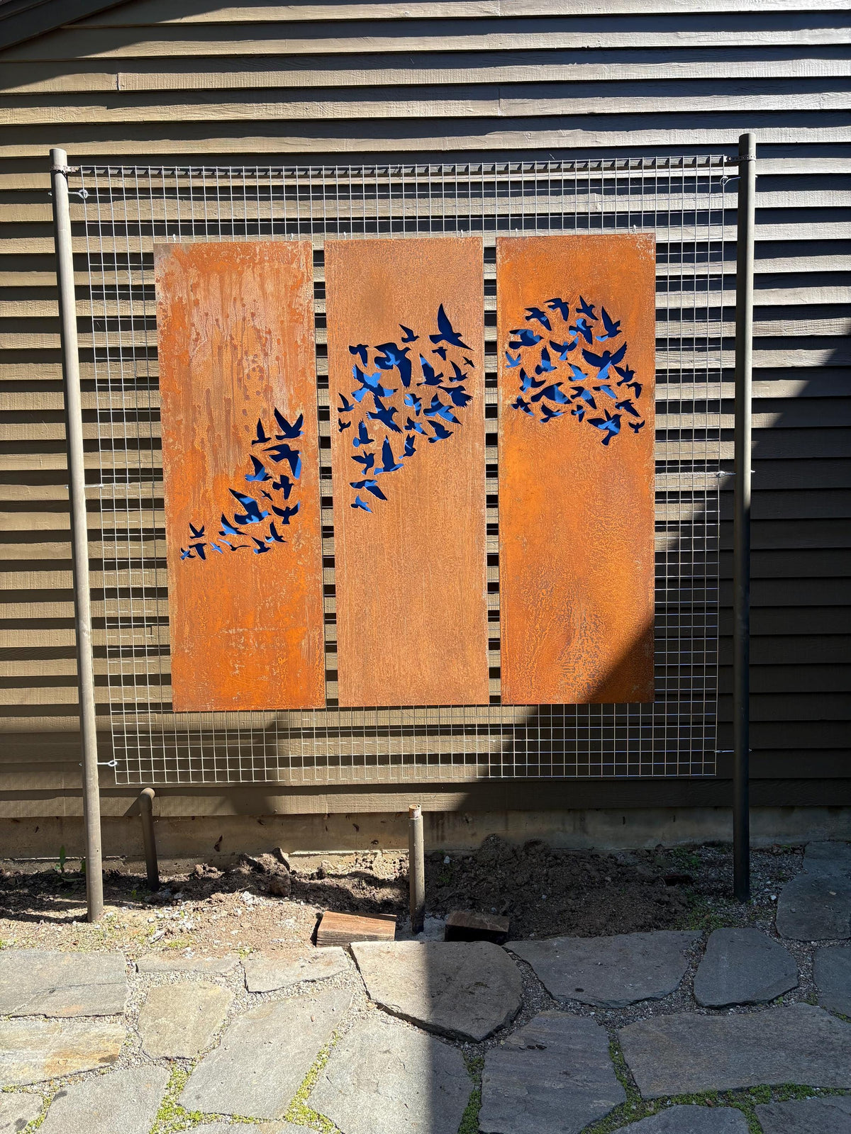 Outdoor metal privacy fence panels set of three, rusted steel with blue bird silhouettes on Tampa Home & Garden Store