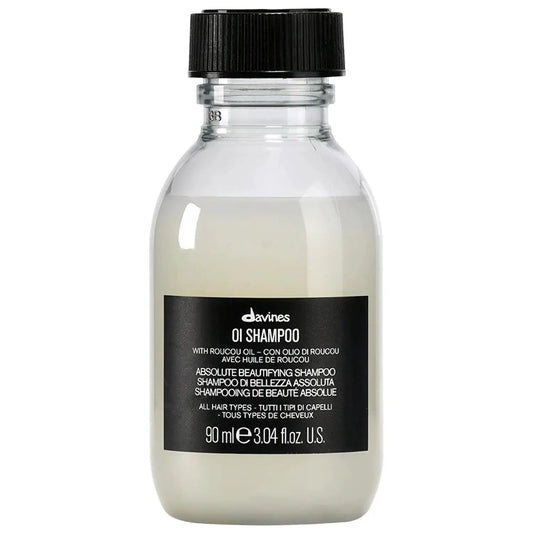 Davines OI Shampoo bottle with a clear container and black label, 90 ml on Tampa Home & Garden Store