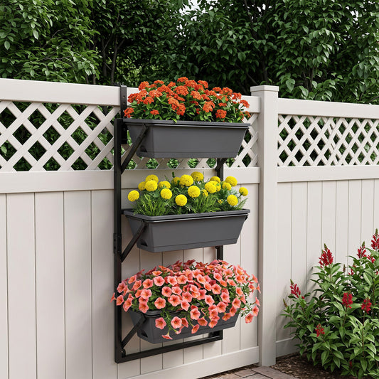 Deck railing planter box, 3-tier adjustable gray planters on black bracket against lattice fence on Tampa Home & Garden Store