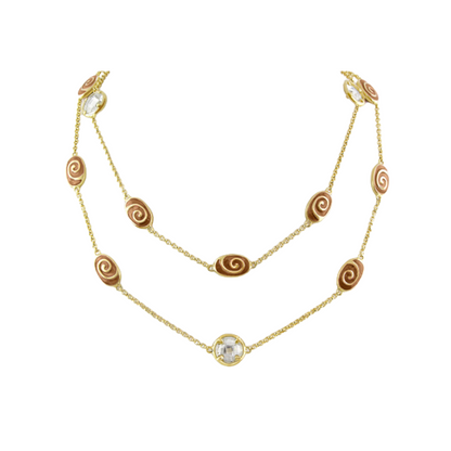 Signature Swirl Long Necklace, gold-tone chain with brown enamel swirls and crystal centerpiece on Tampa Home & Garden Store
