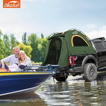Green Dikasun Outdoor pickup bed tent on a black truck with orange window near water on Tampa Home & Garden Store